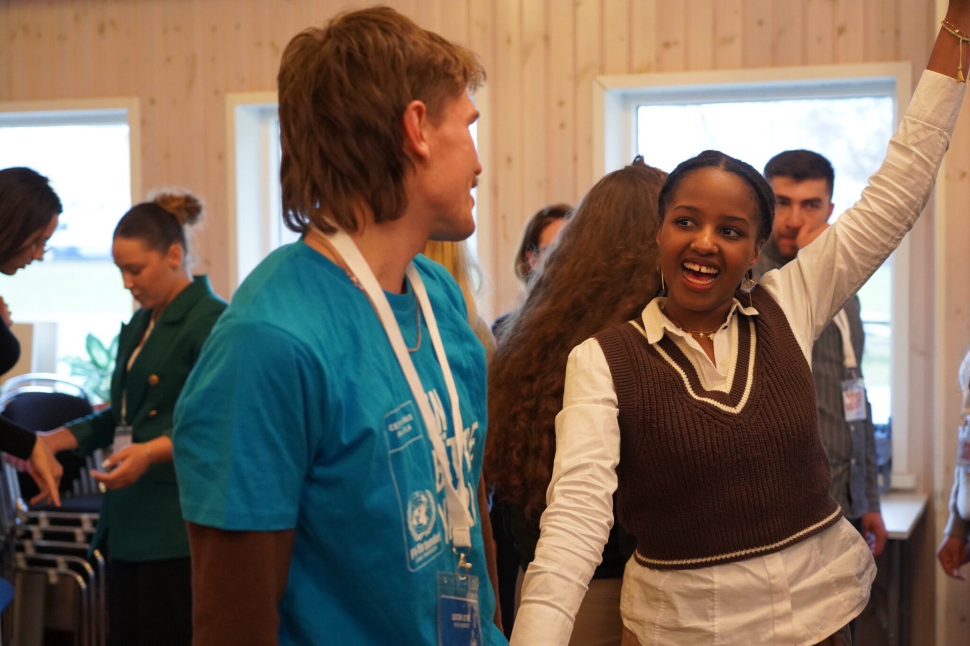 Delegates greeting each other at a Swedish UN Association event